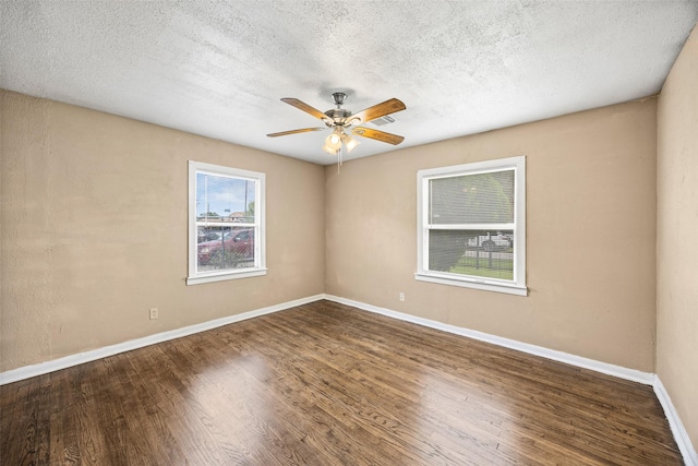 5419 Firefly Ave, Houston, TX 77017 - empty room featuring a ceiling fan, plenty of natural light, a textured ceiling, and wood finished floors