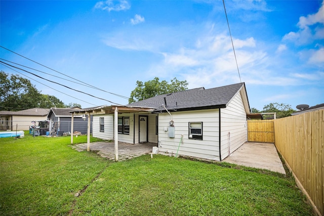 5419 Firefly Ave, Houston, TX 77017 - back of property featuring a patio area, a fenced backyard, and a shingled roof