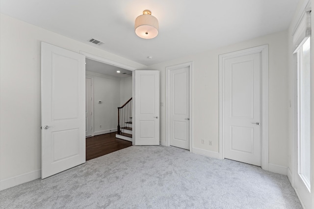 9635 Riddlewood Ln, Houston, TX 77025 - unfurnished bedroom with carpet floors and baseboards