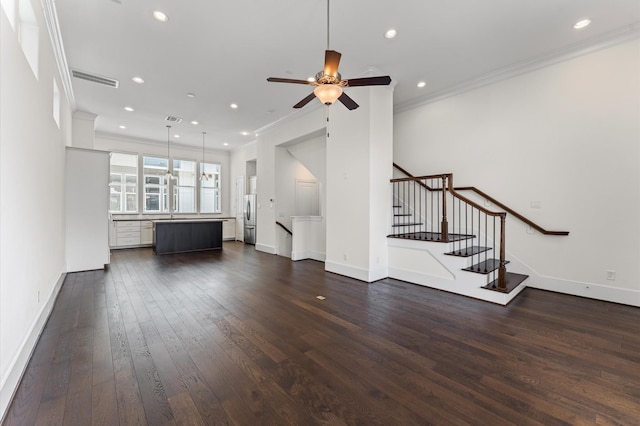 9635 Riddlewood Ln, Houston, TX 77025 - unfurnished living room featuring ornamental molding, recessed lighting, dark wood-style flooring, stairs, and ceiling fan
