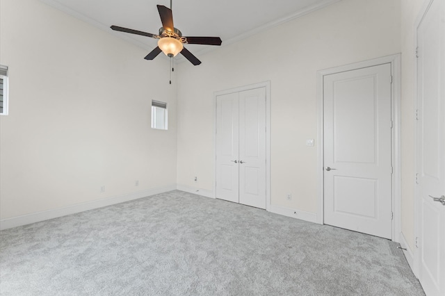 9635 Riddlewood Ln, Houston, TX 77025 - unfurnished bedroom featuring carpet, ornamental molding, a closet, and ceiling fan