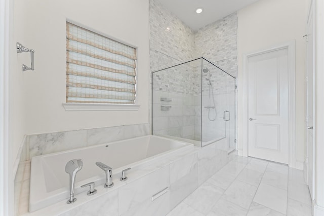 9635 Riddlewood Ln, Houston, TX 77025 - full bath featuring a bath and a stall shower
