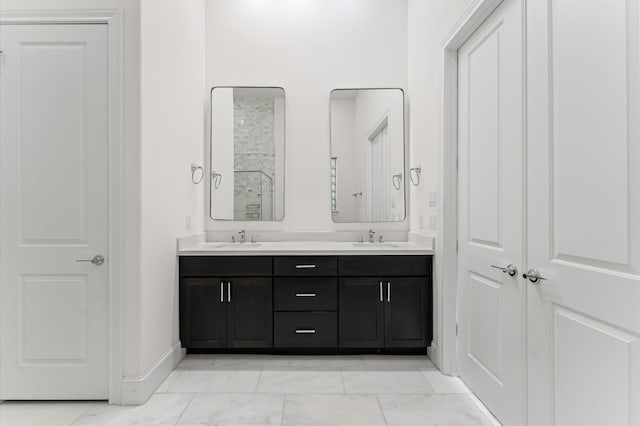 9635 Riddlewood Ln, Houston, TX 77025 - full bathroom with marble finish floors, double vanity, and a shower