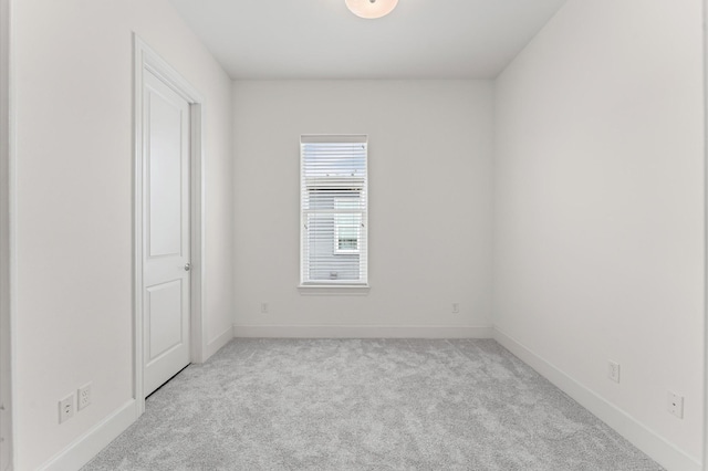 9635 Riddlewood Ln, Houston, TX 77025 - empty room featuring light colored carpet and baseboards