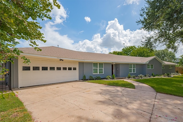 4414 Lemac Dr, Houston, TX 77096 - single story home featuring concrete driveway, a garage, and a front yard