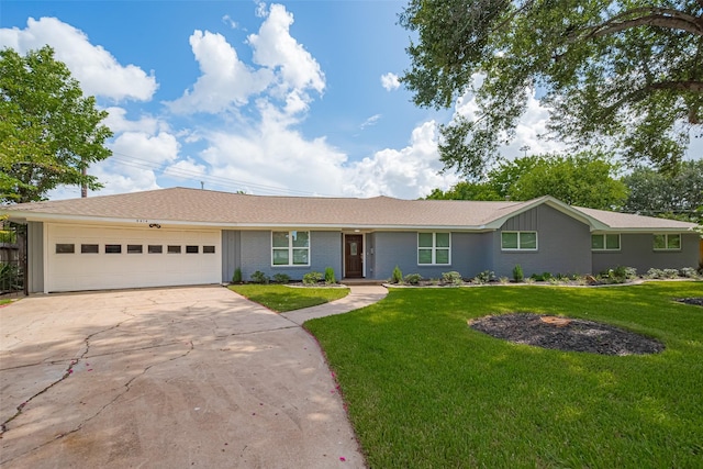 4414 Lemac Dr, Houston, TX 77096 - ranch-style house featuring a garage, driveway, and a front yard