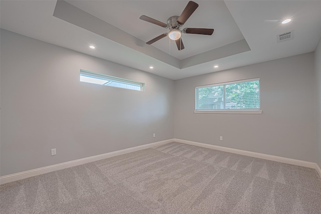 4414 Lemac Dr, Houston, TX 77096 - spare room featuring carpet flooring, recessed lighting, ceiling fan, and a tray ceiling