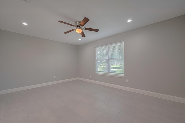 4414 Lemac Dr, Houston, TX 77096 - empty room featuring a ceiling fan, recessed lighting, and light tile patterned flooring