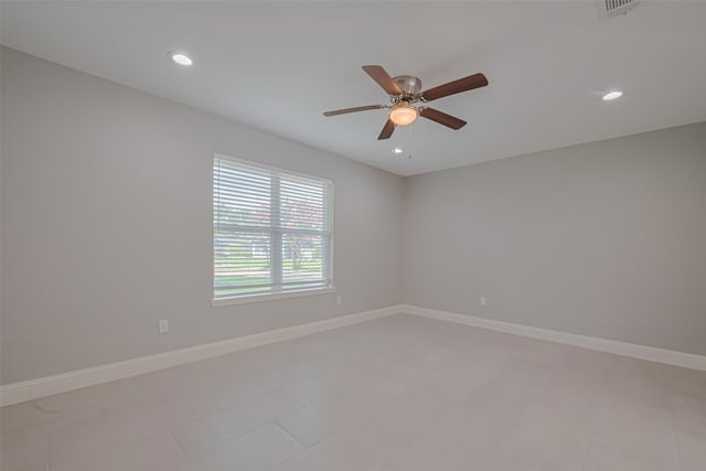 4414 Lemac Dr, Houston, TX 77096 - empty room featuring a ceiling fan, recessed lighting, and light tile patterned floors