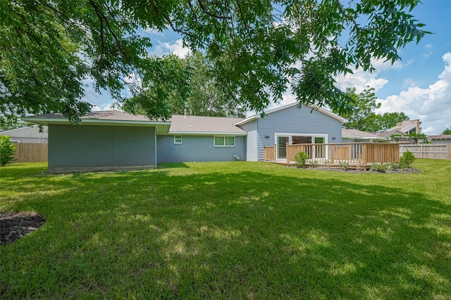 4414 Lemac Dr, Houston, TX 77096 - back of house with a wooden deck and brick siding