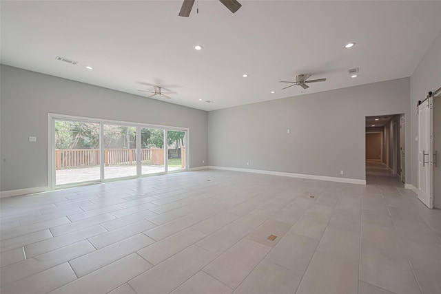 4414 Lemac Dr, Houston, TX 77096 - unfurnished room with ceiling fan, a barn door, and recessed lighting