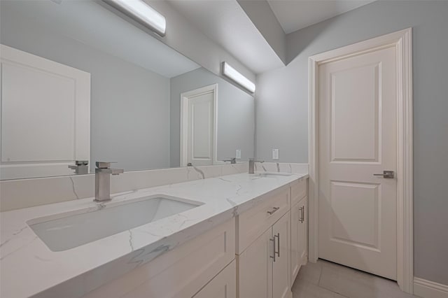 4414 Lemac Dr, Houston, TX 77096 - bathroom with double vanity and tile patterned flooring