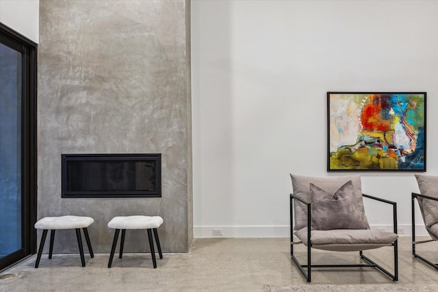 2014 Colquitt, Houston, TX 77098 - living area featuring concrete floors and a fireplace