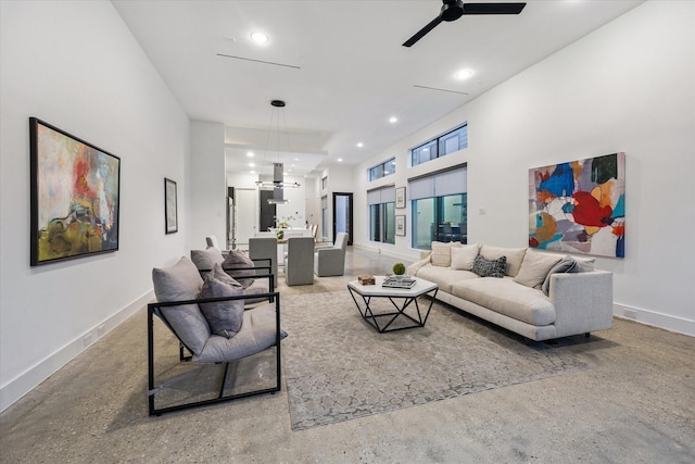 2014 Colquitt, Houston, TX 77098 - living room with a ceiling fan, recessed lighting, and concrete flooring