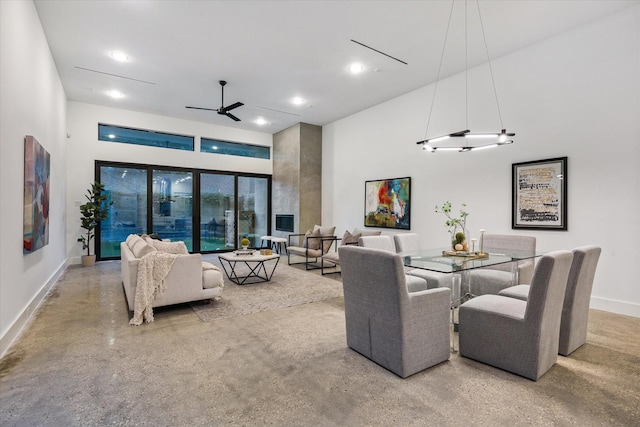 2014 Colquitt, Houston, TX 77098 - dining area with a ceiling fan, a high ceiling, finished concrete flooring, and recessed lighting
