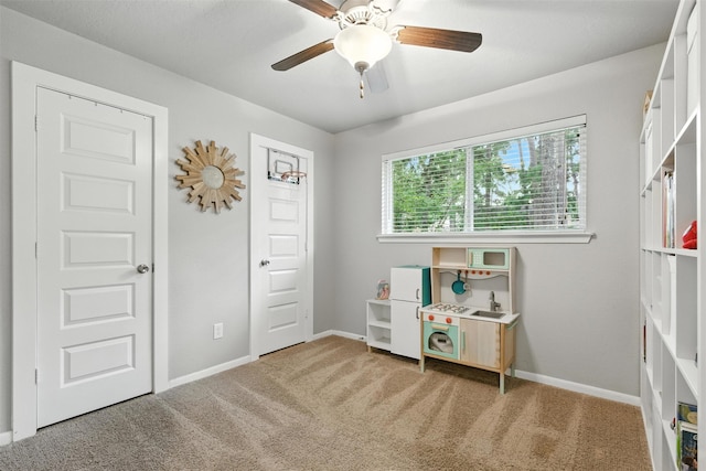79 Fallshire Dr, The Woodlands, TX 77381 - game room with carpet floors and a ceiling fan