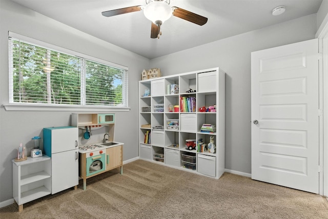 79 Fallshire Dr, The Woodlands, TX 77381 - game room with light colored carpet and ceiling fan