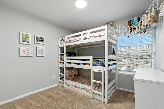 79 Fallshire Dr, The Woodlands, TX 77381 - carpeted bedroom featuring baseboards