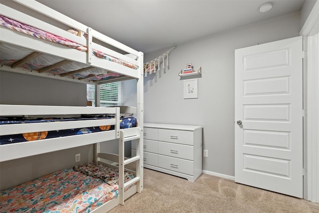79 Fallshire Dr, The Woodlands, TX 77381 - bedroom featuring light colored carpet