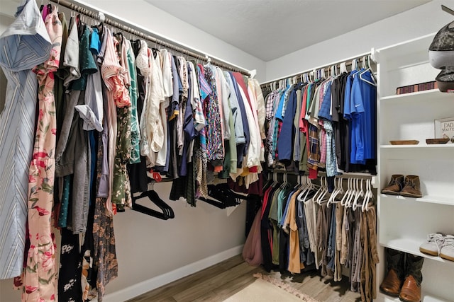 79 Fallshire Dr, The Woodlands, TX 77381 - spacious closet with wood finished floors