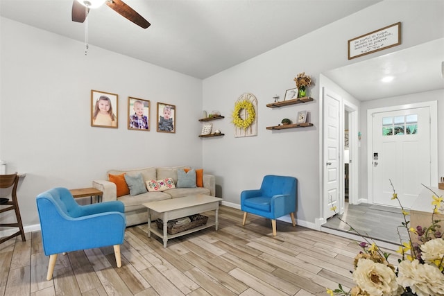 79 Fallshire Dr, The Woodlands, TX 77381 - living area with light wood-style flooring and a ceiling fan
