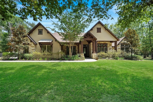 11399 Fm-3126, Livingston, TX 77351 - view of front of house featuring stone siding, stucco siding, and a front lawn