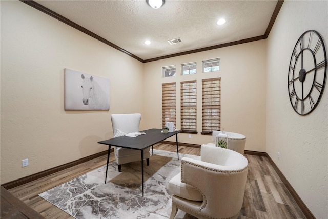 11399 Fm-3126, Livingston, TX 77351 - office space with crown molding, a textured ceiling, wood finished floors, a textured wall, and recessed lighting