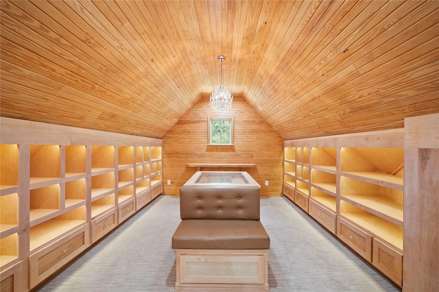 11399 Fm-3126, Livingston, TX 77351 - living area featuring wooden ceiling, wood walls, carpet floors, lofted ceiling, and a chandelier