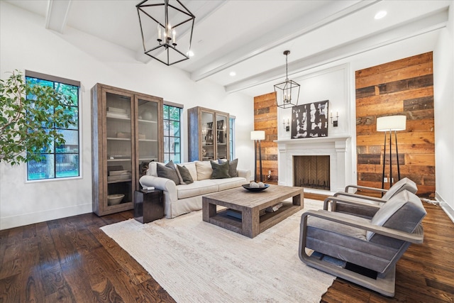 523 E 23rd St, Houston, TX 77008 - living area with beamed ceiling, a chandelier, a fireplace, recessed lighting, and wood finished floors
