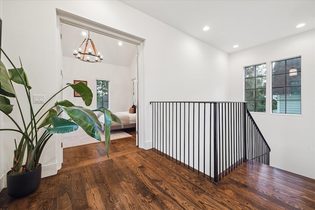 523 E 23rd St, Houston, TX 77008 - corridor featuring an upstairs landing, a chandelier, wood finished floors, and recessed lighting