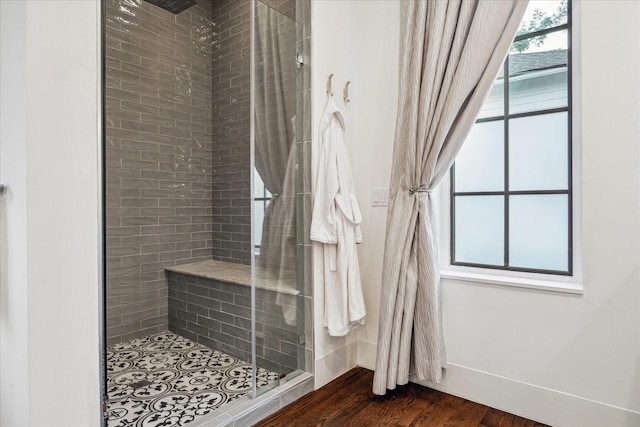 523 E 23rd St, Houston, TX 77008 - full bath featuring a stall shower and wood finished floors