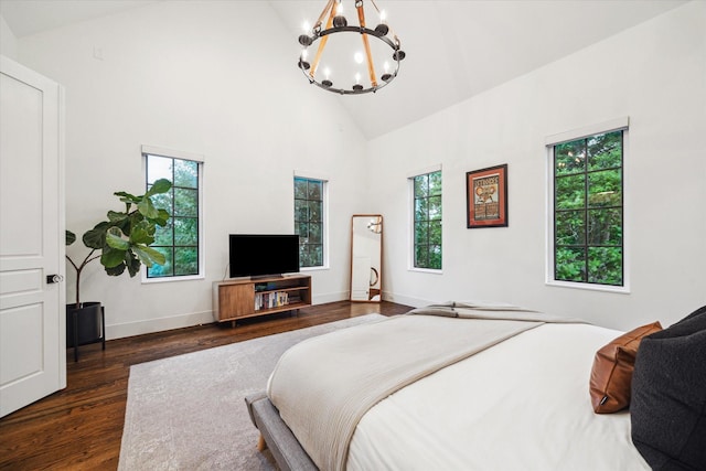 523 E 23rd St, Houston, TX 77008 - bedroom featuring high vaulted ceiling, a chandelier, and dark wood-style flooring
