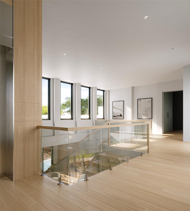 5006 Heatherglen Dr, Houston, TX 77096 - hallway with wood finished floors and recessed lighting