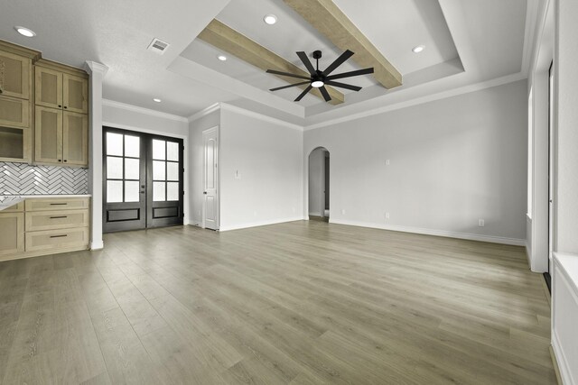 15408 Sandtrap Dr, Waller, TX 77484 - unfurnished living room with french doors, ceiling fan, arched walkways, light wood-style floors, and recessed lighting