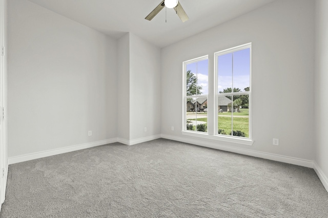 15408 Sandtrap Dr, Waller, TX 77484 - spare room featuring plenty of natural light, carpet, and a ceiling fan