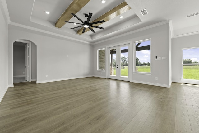 15408 Sandtrap Dr, Waller, TX 77484 - unfurnished room featuring a tray ceiling, ceiling fan, arched walkways, wood finished floors, and ornamental molding