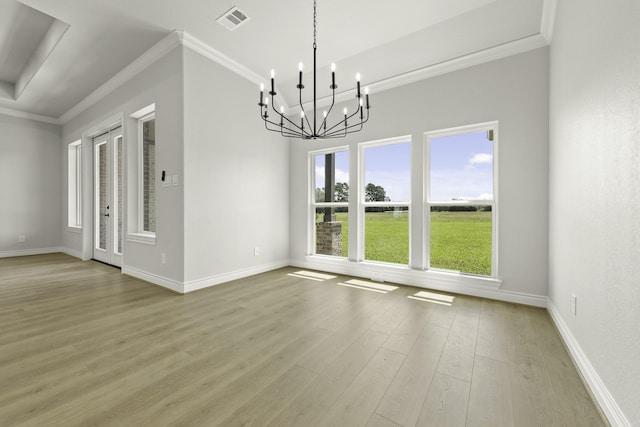 15408 Sandtrap Dr, Waller, TX 77484 - unfurnished dining area featuring light wood-style flooring, ornamental molding, and a chandelier