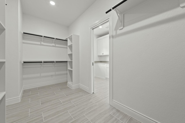 15408 Sandtrap Dr, Waller, TX 77484 - walk in closet with light wood-type flooring