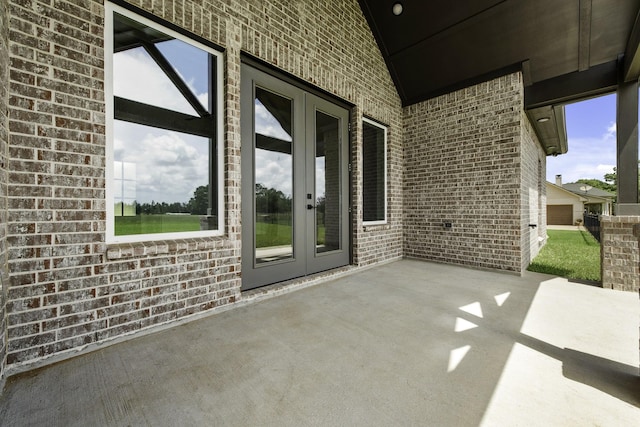 15408 Sandtrap Dr, Waller, TX 77484 - view of patio / terrace featuring french doors