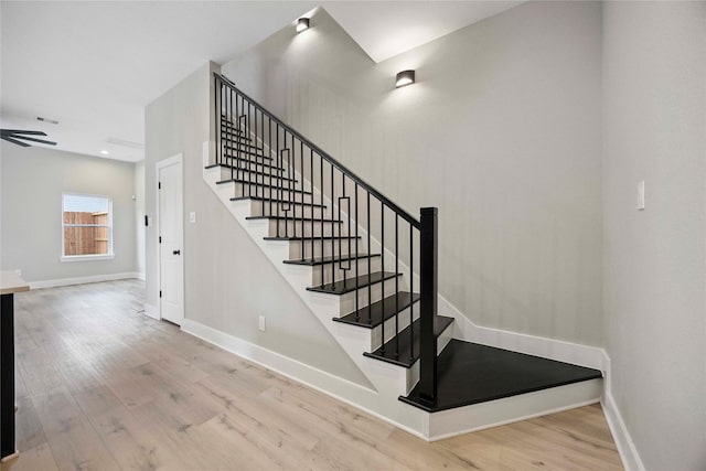 217 Pheasant St, Houston, TX 77018 - stairway featuring wood finished floors and recessed lighting