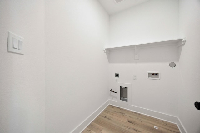 217 Pheasant St, Houston, TX 77018 - laundry area with hookup for a gas dryer, washer hookup, light wood-type flooring, and electric dryer hookup