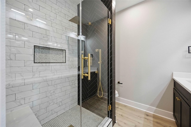217 Pheasant St, Houston, TX 77018 - full bathroom with vanity, a stall shower, and wood finished floors