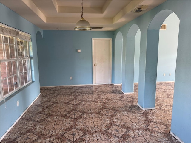 5518 Rio Ramos St, Rosharon, TX 77583 - empty room featuring a raised ceiling