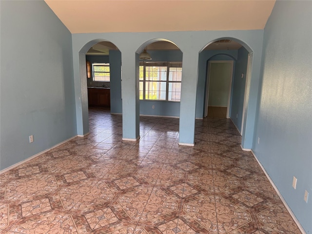 5518 Rio Ramos St, Rosharon, TX 77583 - spare room featuring arched walkways
