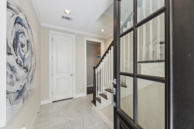 521 W Bell St, Houston, TX 77019 - entryway with ornamental molding, stairs, light marble finish floors, and recessed lighting