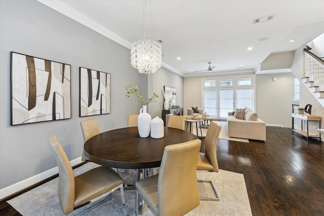 521 W Bell St, Houston, TX 77019 - dining room with wood finished floors, stairway, ceiling fan, crown molding, and a chandelier