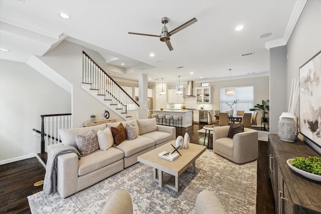 521 W Bell St, Houston, TX 77019 - living area with ceiling fan, wood finished floors, recessed lighting, ornamental molding, and decorative columns