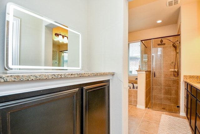 29011 Oldfield Ct, Katy, TX 77494 - bathroom with vanity, a shower stall, and tile patterned floors