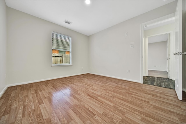 11703 Elizabeth Ct, Pinehurst, TX 77362 - unfurnished room featuring light wood-type flooring and baseboards