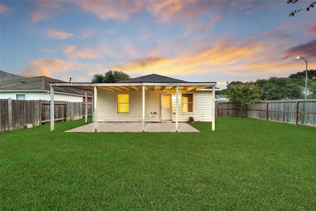 11703 Elizabeth Ct, Pinehurst, TX 77362 - back of house featuring a patio and a fenced backyard